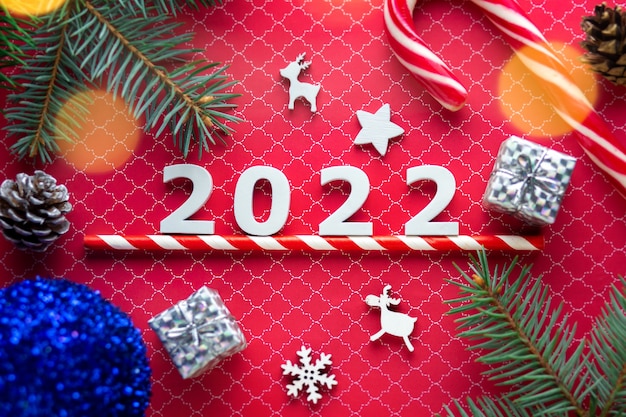 Christmas 2022 Candy Premium Photo | Merry Christmas 2022 Numbers 2022 With New Years Candy And  Christmas Tree New Year Concept