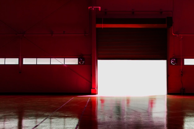 metal factory door with light from the sun use color tool change to red color filter premium photo
