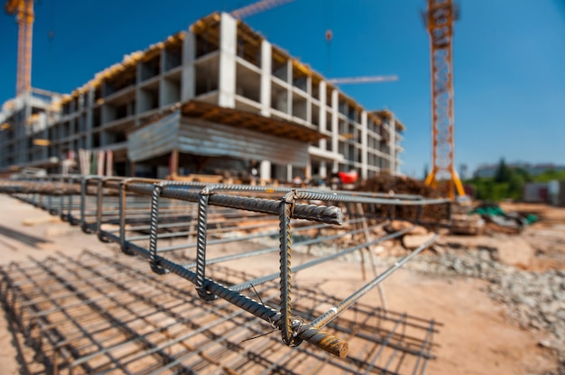 Premium Photo Metal Frame On A Construction Site With A Blurry Plan