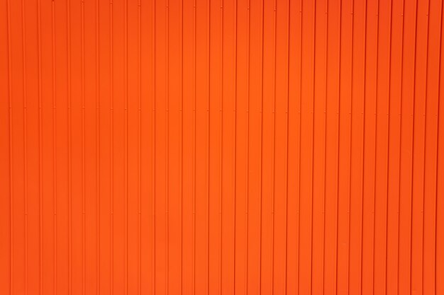 縦線のメタリックの赤い背景 プレミアム写真