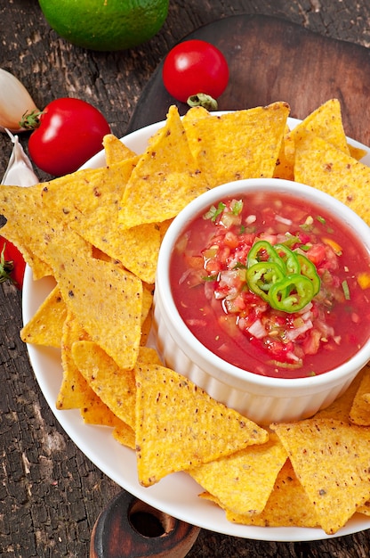 Free Photo | Mexican nacho chips and salsa dip in bowl