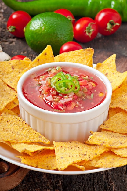 Free Photo | Mexican nacho chips and salsa dip in bowl