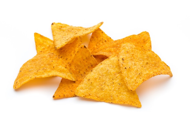 Premium Photo | Mexican nachos chips, isolated on white surface.