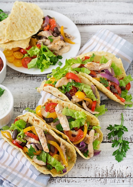 Free Photo | Mexican tacos with chicken, bell peppers, black beans and ...