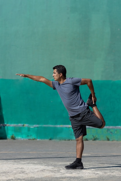 Premium Photo | Mexican young man exercising outdoors