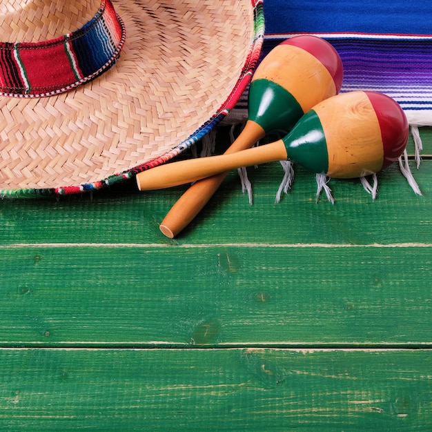 Premium Photo | Mexico cinco de mayo wood background mexican sombrero