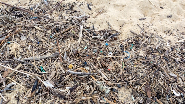 Premium Photo | Micro plastics washing ashore on the beach polluted ...