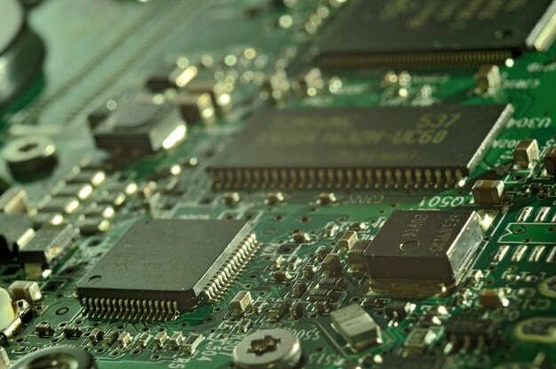 Premium Photo | Microchips on a circuit board. electrical, system.