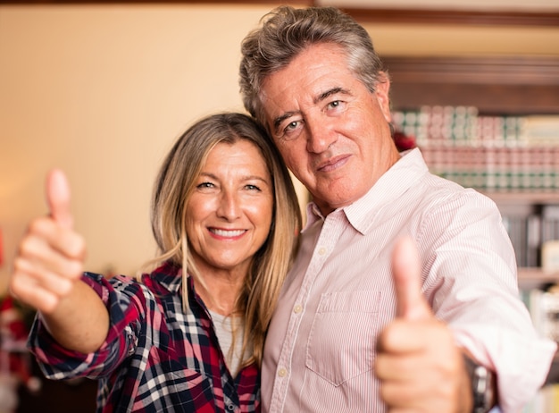 Middle Aged Couple Having Fun On Christmas Photo Free Download