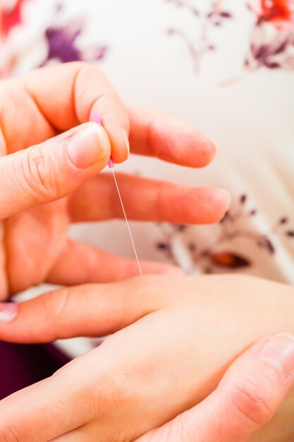 Premium Photo Midwife Giving Pregnancy Acupuncture