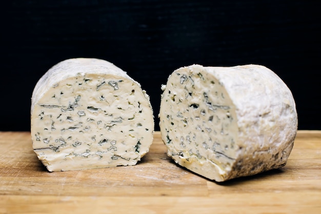 Premium Photo | Mild blue auvergne cheese fourme d' ambert from france