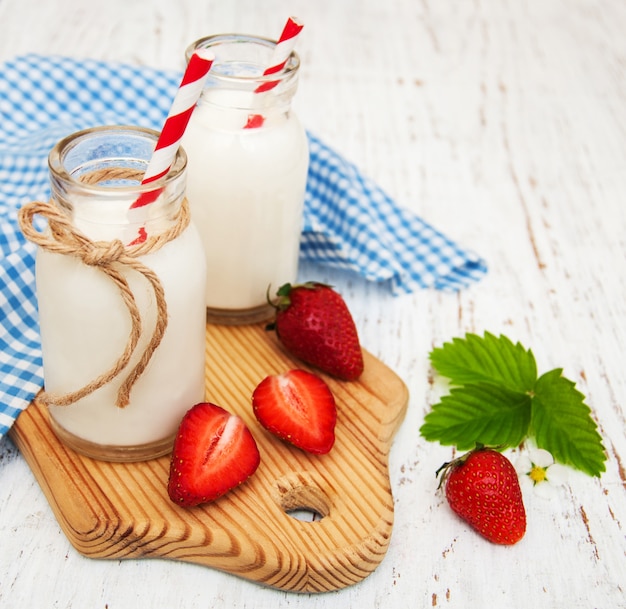 Premium Photo | Milk and strawberries