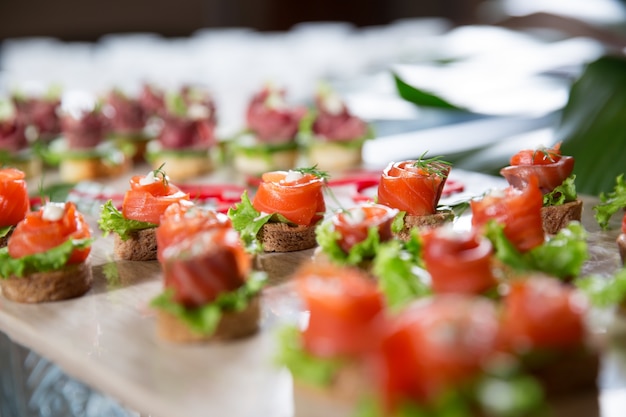 Free Photo Mini Canapes With Smoked Salmon On Buffet Table