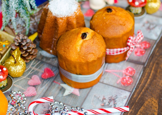 Premium Photo | Mini panettone and pandoro, with fruits and christmas ...