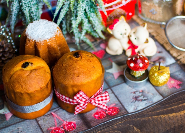 Premium Photo | Mini panettone and pandoro, with fruits and christmas ...