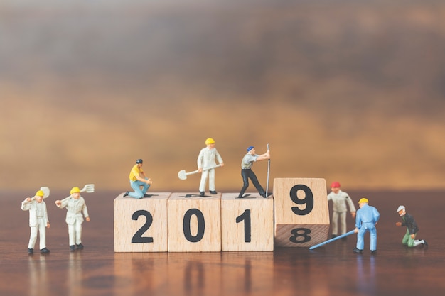 miniature worker figures