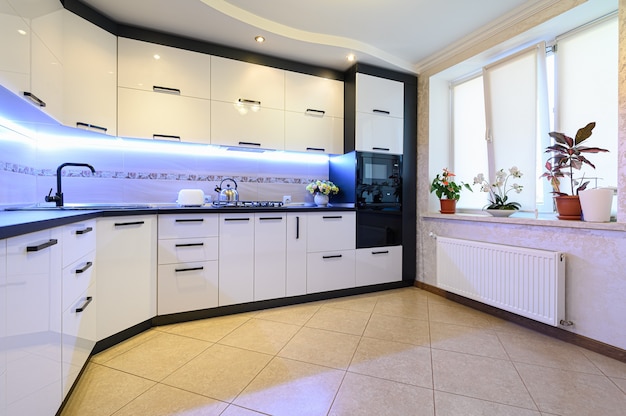 Premium Photo | Minimal simple white large modern kitchen interior, closeup