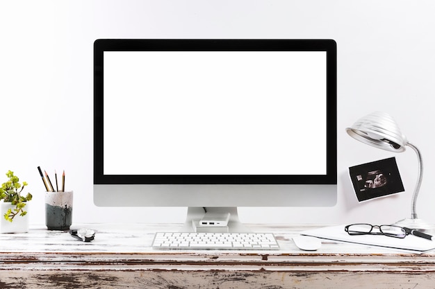 Premium Photo | Minimalistic working desk with blank monitor screen