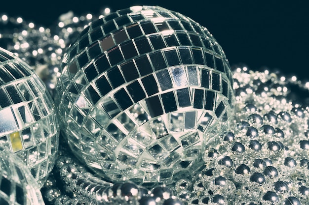 Premium Photo | Mirror balls reflecting lights close up, nightlife