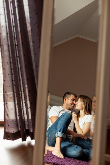 Free Photo | Mirror portrait of happy couple