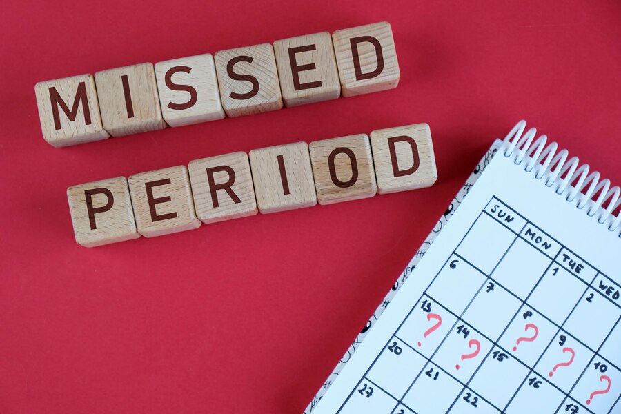 Premium Photo Missed period and marking on calendar. woman's health