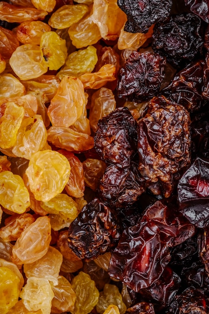 Free Photo | Mix of dried fruits golden raisins with cherries top view