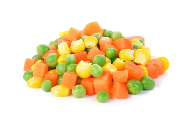 Premium Photo Mix Of Vegetable Containing Carrots Peas And Corn On White
