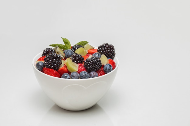 Premium Photo | Mixed of color fruits. sweet fruits and mixed berries.