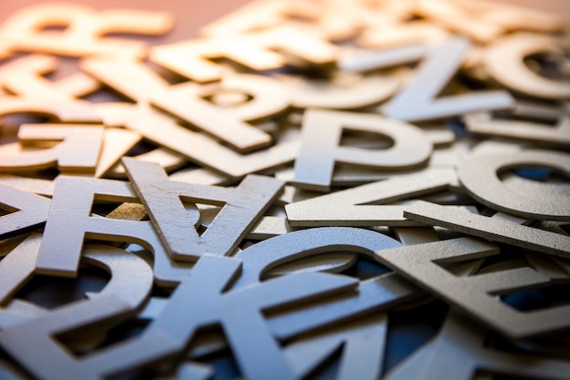 premium-photo-mixed-letters-pile-closeup-photo