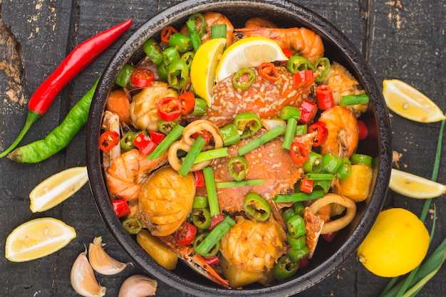 Premium Photo | Mixed seafood dry pot, crab, abalone, shrimp