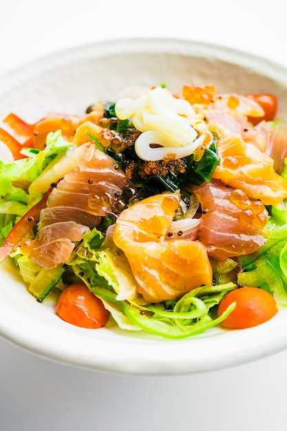 Free Photo | Mixed seafood salad with salmon tuna squid and other fish