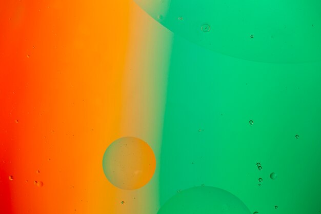 Free Photo | Mixing water and oil on a coloured liquid abstract background