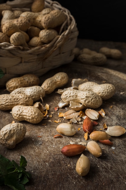 Mixture of delicious peanuts on the table Photo | Free Download