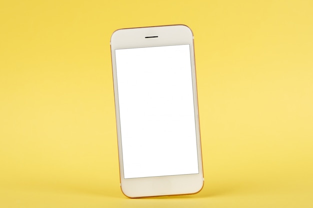 Download Mobile phone mock up on yellow background | Premium Photo