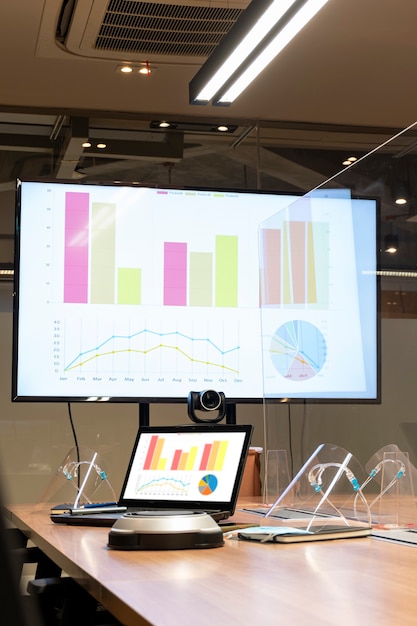 Premium Photo | Mock up chart presentation on display laptop and ...