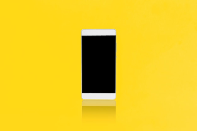 Download Premium Photo Mock Up Smart Phone On A Yellow Background Design For Advertising PSD Mockup Templates
