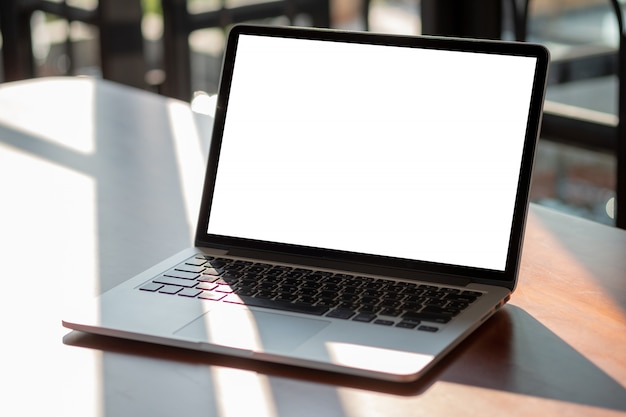 Mock up using laptop with blank screen computer modern Premium Photo