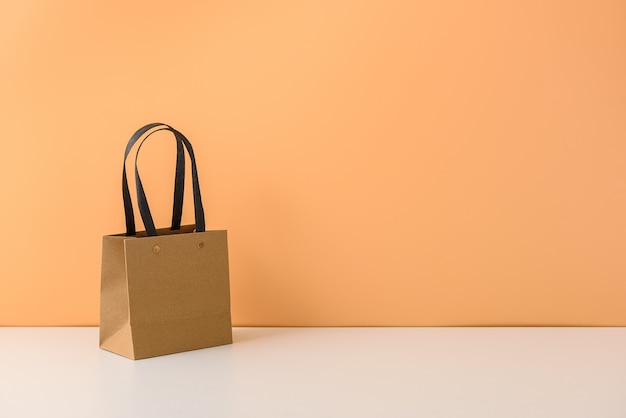 Download Mockup of blank craft package or brown paper shopping bag ...