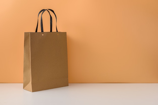 Download Mockup of blank craft package or brown paper shopping bag ...