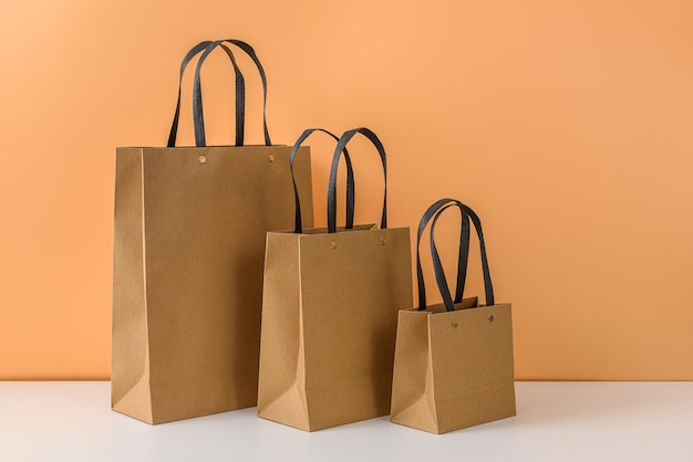 Download Mockup of blank craft package or brown paper shopping bag ...