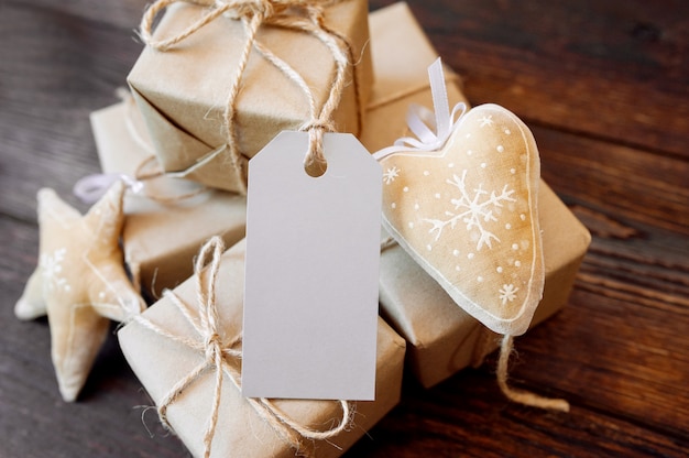 Download Premium Photo | Mockup christmas kraft gift boxes with tag ...