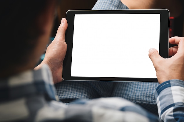 Mockup tablet image, man using tablet computer Premium Photo