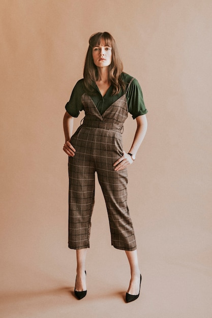 Premium Photo | Model in a plaid jumpsuit