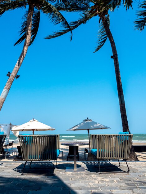 Modern Chairs With Side Table On Balcony With Sea View Premium Photo