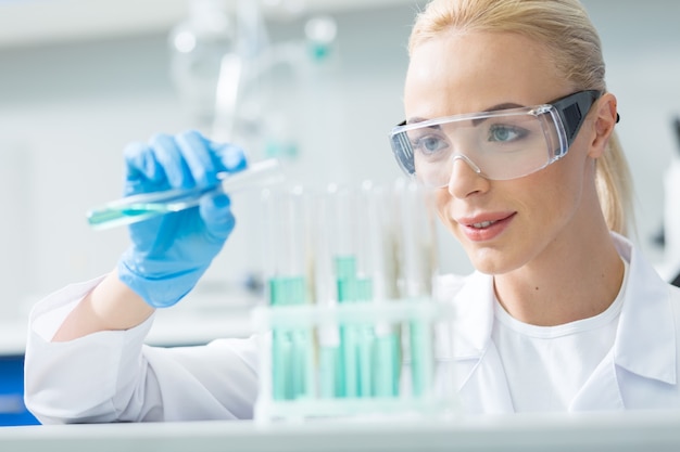 Premium Photo | Modern chemistry. cheerful nice female chemist wearing ...