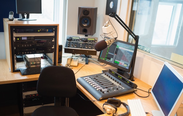 Premium Photo | Modern equipment on desk in radio studio