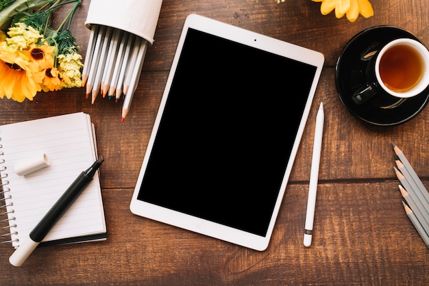 Modern office desk composition with technological device Free Photo