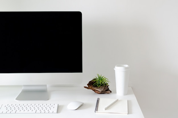 Premium Photo Modern Personal Computer Screen On White Table With A Cup Of Coffee