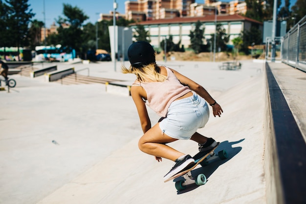 Free Photo | Modern woman, skateboard and sunny day