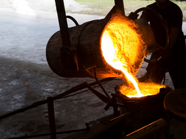 Premium Photo | Molten iron molten metal poured in to ladle